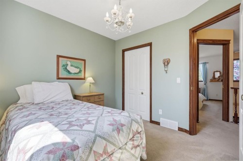 12 Valley Glen Heights Nw, Calgary, AB - Indoor Photo Showing Bedroom