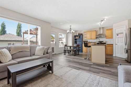 134 Prestwick Landing Se, Calgary, AB - Indoor Photo Showing Living Room