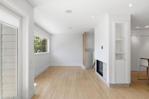 4935 10 Avenue Sw, Calgary, AB - Indoor Photo Showing Other Room With Fireplace