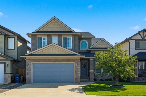 809 Canoe Green Sw, Airdrie, AB - Outdoor With Facade
