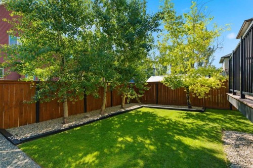 809 Canoe Green Sw, Airdrie, AB - Outdoor With Backyard