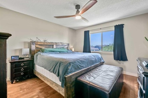 13 Dain Place Nw, Langdon, AB - Indoor Photo Showing Bedroom