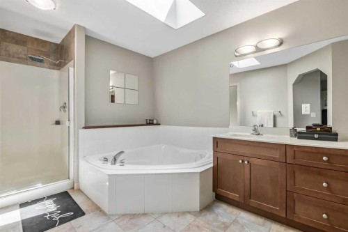 13 Dain Place Nw, Langdon, AB - Indoor Photo Showing Bathroom