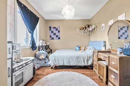 13 Dain Place Nw, Langdon, AB - Indoor Photo Showing Bedroom