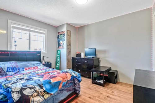 13 Dain Place Nw, Langdon, AB - Indoor Photo Showing Bedroom