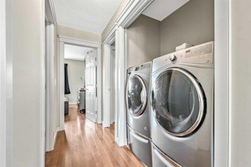 13 Dain Place Nw, Langdon, AB - Indoor Photo Showing Laundry Room