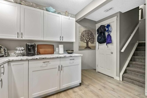 13 Dain Place Nw, Langdon, AB - Indoor Photo Showing Kitchen