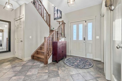 13 Dain Place Nw, Langdon, AB - Indoor Photo Showing Other Room