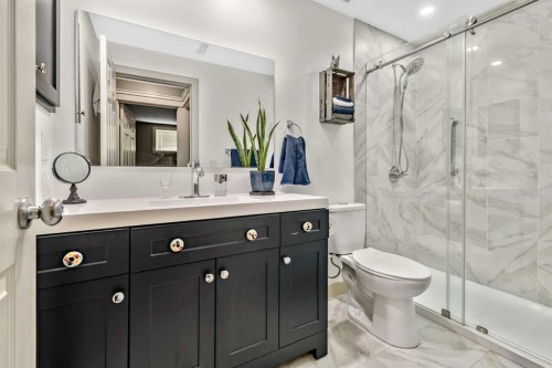 13 Dain Place Nw, Langdon, AB - Indoor Photo Showing Bathroom