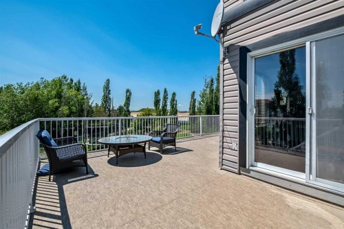 13 Dain Place Nw, Langdon, AB - Outdoor With Deck Patio Veranda