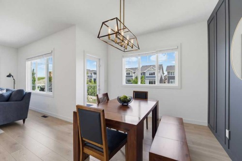 136 Sunrise Common, Cochrane, AB - Indoor Photo Showing Dining Room