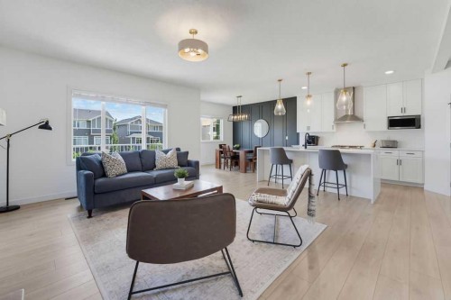 136 Sunrise Common, Cochrane, AB - Indoor Photo Showing Living Room