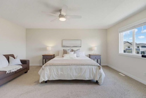 136 Sunrise Common, Cochrane, AB - Indoor Photo Showing Bedroom