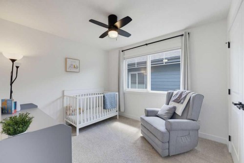 136 Sunrise Common, Cochrane, AB - Indoor Photo Showing Bedroom