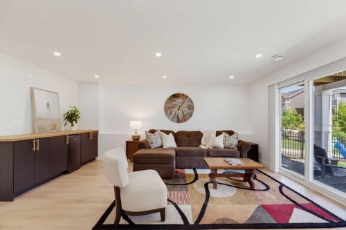 136 Sunrise Common, Cochrane, AB - Indoor Photo Showing Living Room