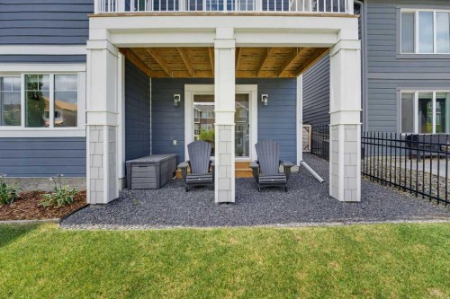 136 Sunrise Common, Cochrane, AB - Outdoor With Deck Patio Veranda With Exterior