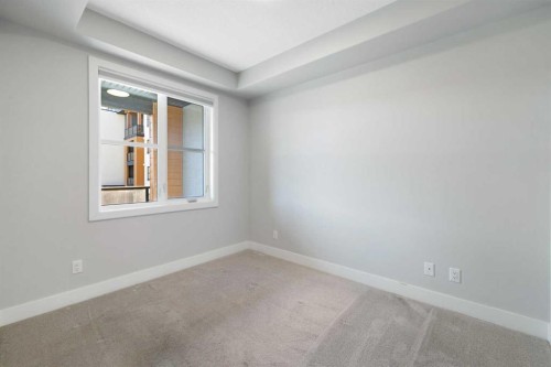 219-8355 19 Avenue Sw, Calgary, AB - Indoor Photo Showing Other Room