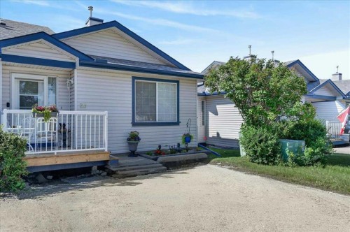 23-33 Stonegate Drive Nw, Airdrie, AB - Outdoor With Deck Patio Veranda