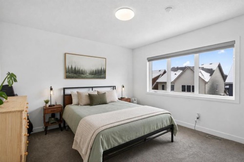 48 Willow Green Sw, Airdrie, AB - Indoor Photo Showing Bedroom