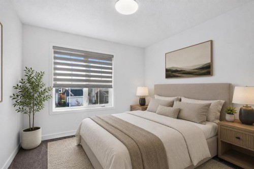 48 Willow Green Sw, Airdrie, AB - Indoor Photo Showing Bedroom