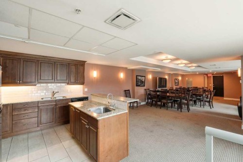 604-920 5 Avenue Sw, Calgary, AB - Indoor Photo Showing Kitchen With Double Sink