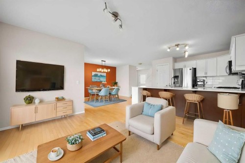 73 Sunset Heights, Cochrane, AB - Indoor Photo Showing Living Room