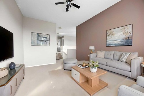 73 Sunset Heights, Cochrane, AB - Indoor Photo Showing Living Room