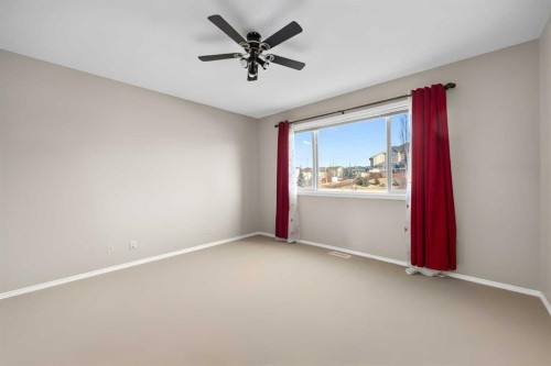 73 Sunset Heights, Cochrane, AB - Indoor Photo Showing Other Room