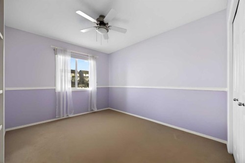 73 Sunset Heights, Cochrane, AB - Indoor Photo Showing Other Room