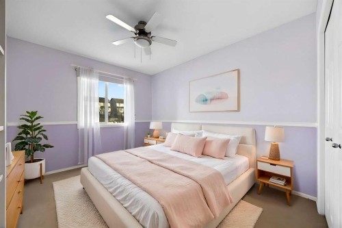 73 Sunset Heights, Cochrane, AB - Indoor Photo Showing Bedroom