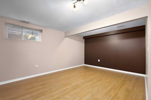 73 Sunset Heights, Cochrane, AB - Indoor Photo Showing Other Room