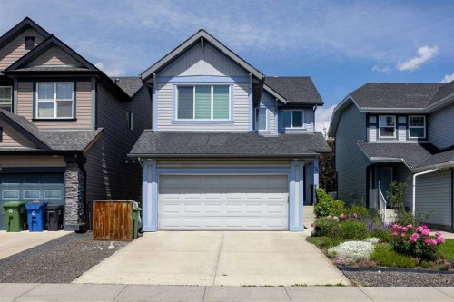 73 Sunset Heights, Cochrane, AB - Outdoor With Facade