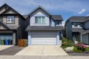 73 Sunset Heights, Cochrane, AB  - Outdoor With Facade 