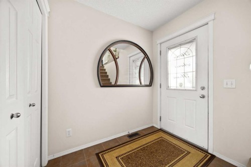 73 Sunset Heights, Cochrane, AB - Indoor Photo Showing Other Room