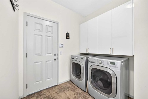 279 Copperpond Circle Se, Calgary, AB - Indoor Photo Showing Laundry Room