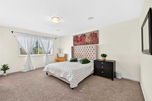 279 Copperpond Circle Se, Calgary, AB - Indoor Photo Showing Bedroom