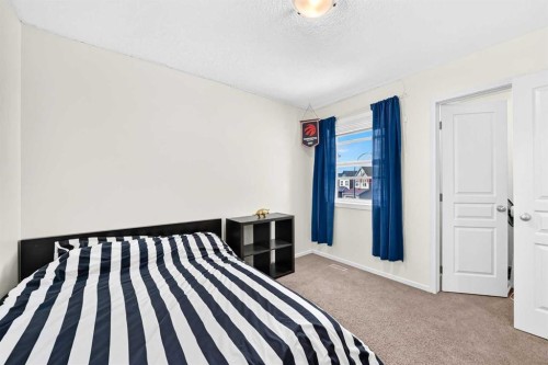 279 Copperpond Circle Se, Calgary, AB - Indoor Photo Showing Bedroom