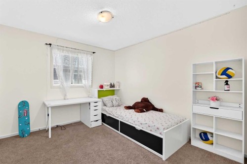 279 Copperpond Circle Se, Calgary, AB - Indoor Photo Showing Bedroom