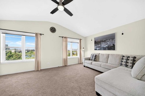 279 Copperpond Circle Se, Calgary, AB - Indoor Photo Showing Living Room
