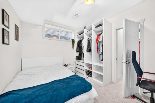 279 Copperpond Circle Se, Calgary, AB - Indoor Photo Showing Bedroom