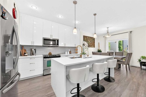 279 Copperpond Circle Se, Calgary, AB - Indoor Photo Showing Kitchen With Stainless Steel Kitchen With Upgraded Kitchen