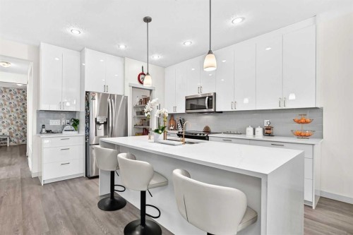 279 Copperpond Circle Se, Calgary, AB - Indoor Photo Showing Kitchen With Stainless Steel Kitchen With Upgraded Kitchen