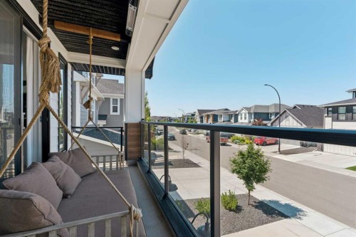203 Cranbrook Park Se, Calgary, AB - Outdoor With Balcony