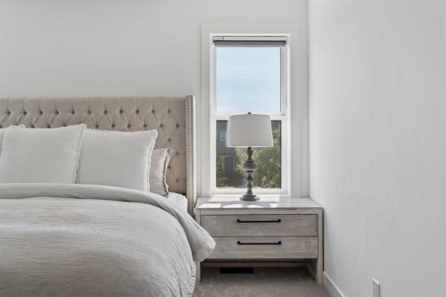 203 Cranbrook Park Se, Calgary, AB - Indoor Photo Showing Bedroom