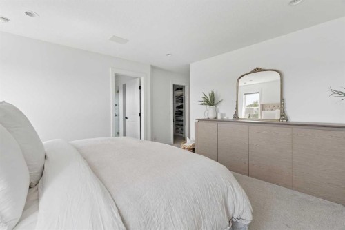 203 Cranbrook Park Se, Calgary, AB - Indoor Photo Showing Bedroom