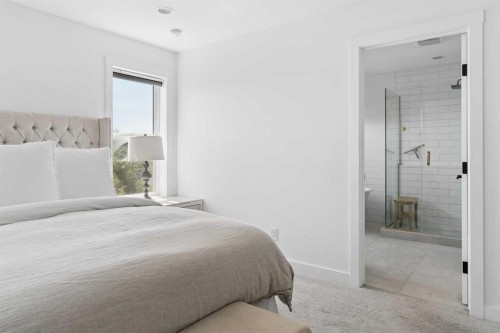 203 Cranbrook Park Se, Calgary, AB - Indoor Photo Showing Bedroom