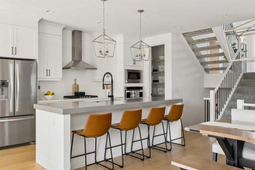 203 Cranbrook Park Se, Calgary, AB - Indoor Photo Showing Kitchen With Upgraded Kitchen