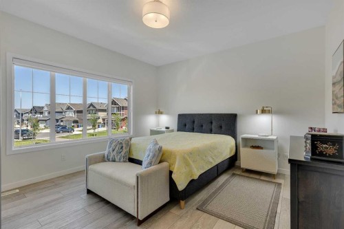 168 Magnolia Manor Se, Calgary, AB - Indoor Photo Showing Bedroom