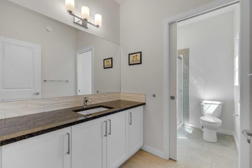 168 Magnolia Manor Se, Calgary, AB - Indoor Photo Showing Bathroom