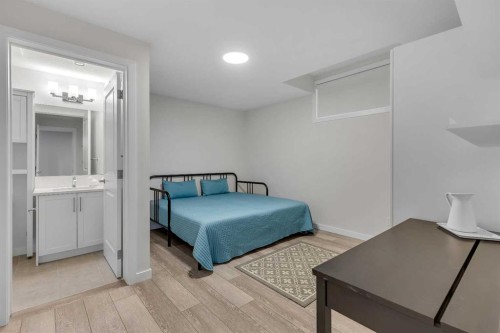 168 Magnolia Manor Se, Calgary, AB - Indoor Photo Showing Bedroom